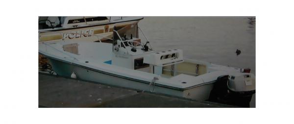 I purchsed her (Ebay) and used her the first season (09/05). 
Note-The gunnel rod boxes were in peices. I taped them from behind and sprayed the fronts W/Rino Liner... I should have tinted it white. But are they strong now!