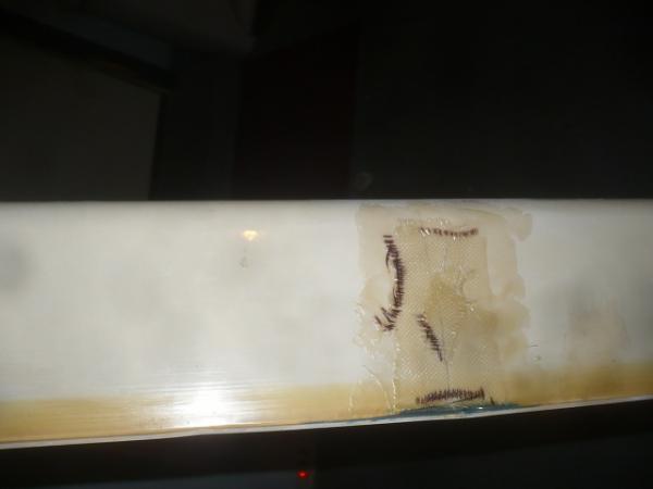 Glassed behind the big cracks in the rod boxes