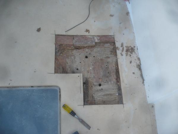 Cut out the floor under the captains chair for reinforcement.  I'm not ready to take on the entire floor and this was the only place it was really soft.