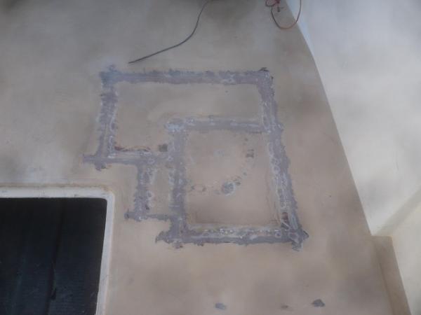 After a little grinding, glassing, sanding, glassing, and sanding the floor is pretty smooth.  Painting the floors will probably be one of the last tasks on the list.