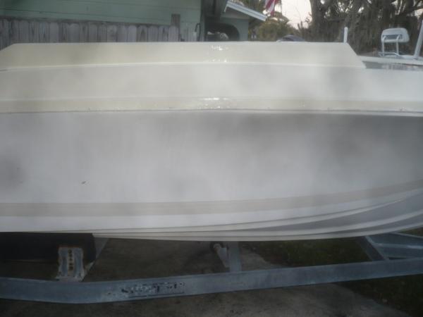 I only painted above the rubrail.  Later on, I'll be painting the floors beige.  I'm going to try and buff the hull and restore the gelcoat as it appears where the stripe decal was removed.